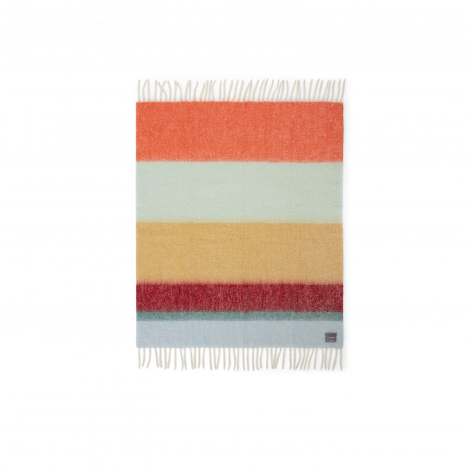 A luxurious fully unfolded stripe orange, mint and red Mohair plaid on a white backdrop.