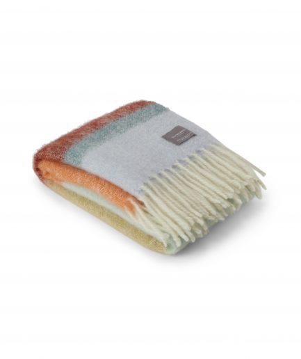 A luxurious stripe orange, mint and red Stackelbergs Mohair plaid on a white backdrop.