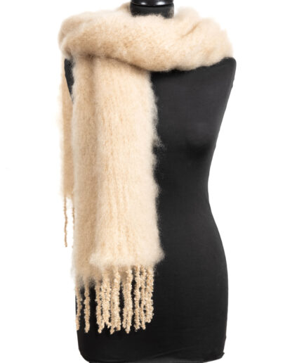 A luxurious fluffy scarf/ mohair plaid in sand on a white backdrop.