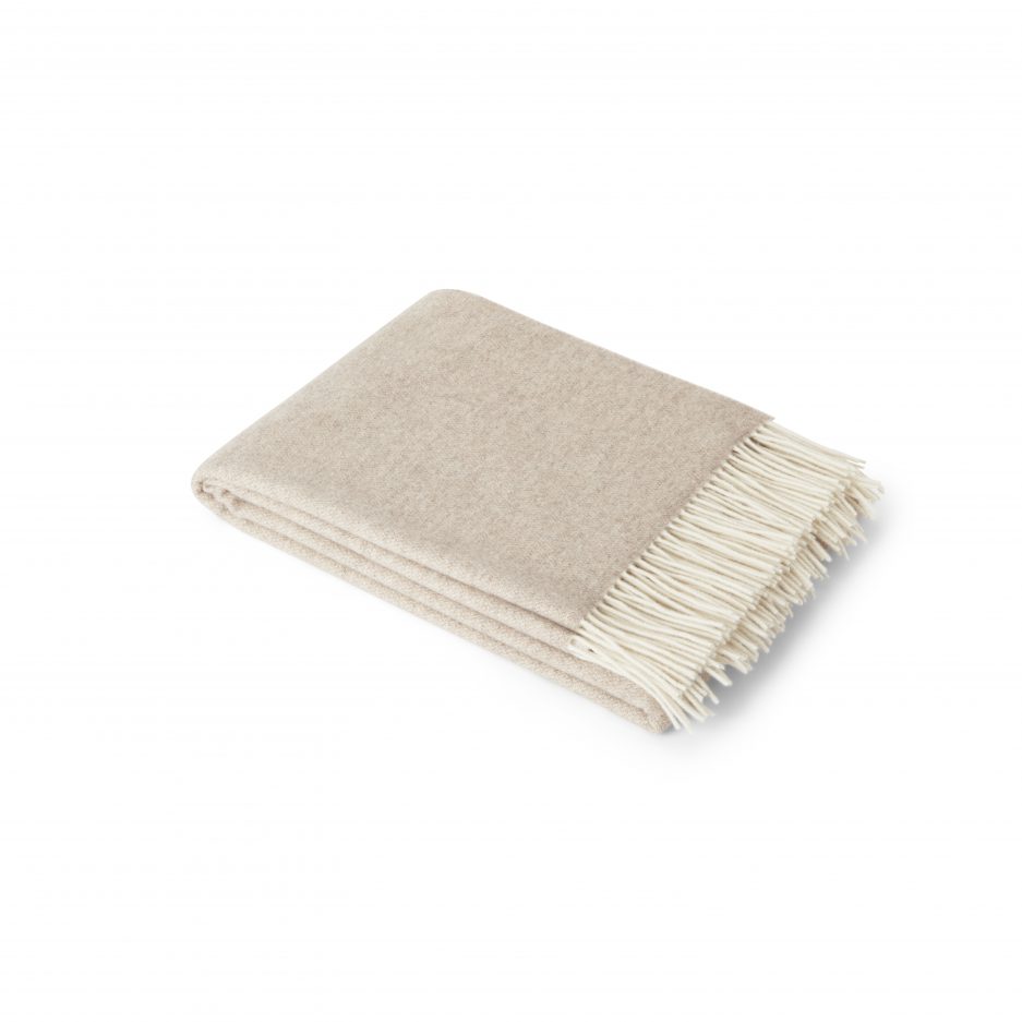 A luxurious Merino & Cashmere two tone light taupe wool plaid on a white backdrop.