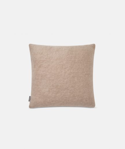 A luxurious Stackelbergs Mohair Cushion cover in Portabello on a white backdrop