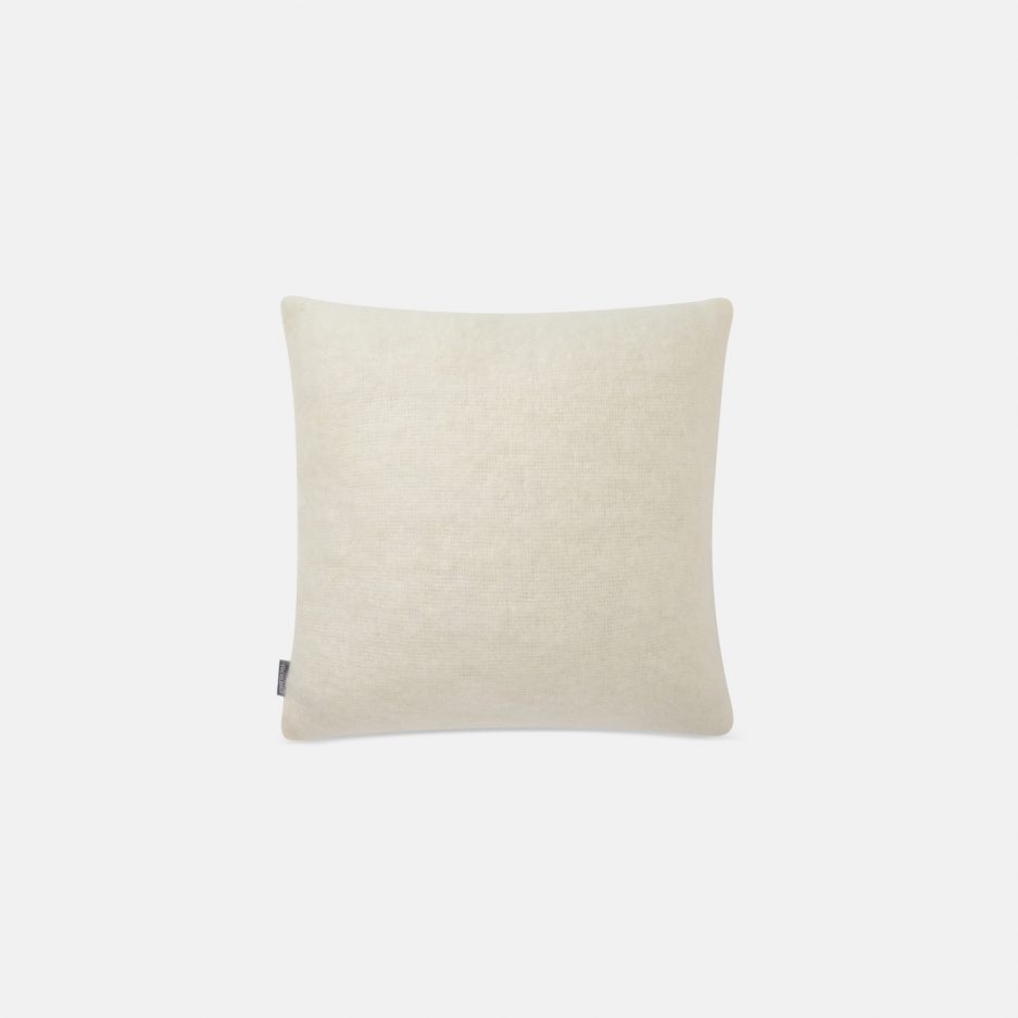 A luxurious Stackelbergs Mohair Cushion cover in Bright White on a white backdrop