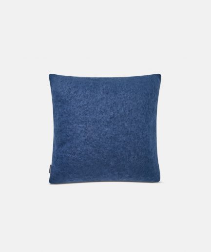 A luxurious Stackelbergs Mohair Cushion cover in Denim Dark Blue on a white backdrop