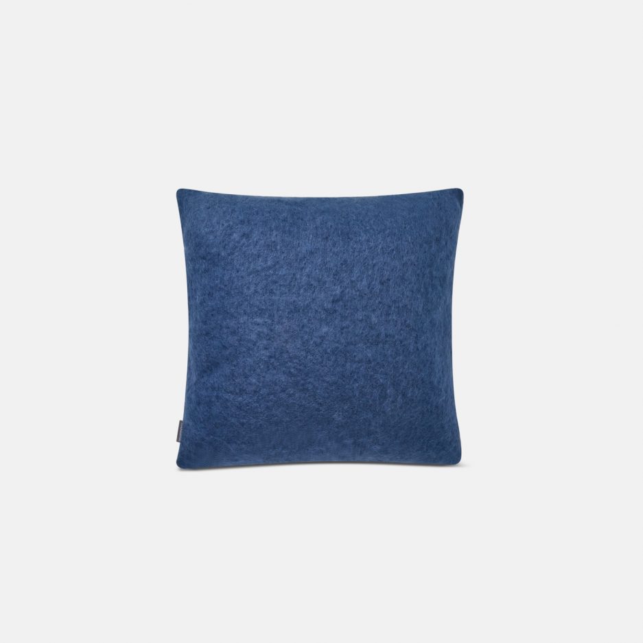 A luxurious Stackelbergs Mohair Cushion cover in Denim Dark Blue on a white backdrop