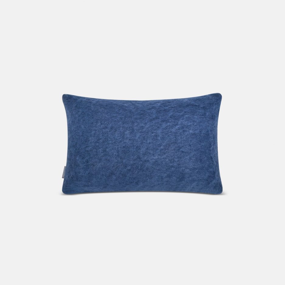 A luxurious Stackelbergs Mohair Cushion cover in Denim Dark Blue on a white backdrop